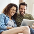 Couple using tablet